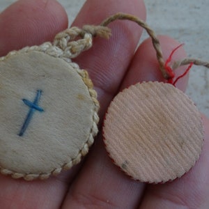 Religious French catholic relic shrine reliquary of cloth with cross crucifix attached to each other. ( Z 11 )