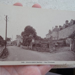 carte postale vintage Français de la rue principale de Chahaignes ( Charthe ) en France. ( 8 )