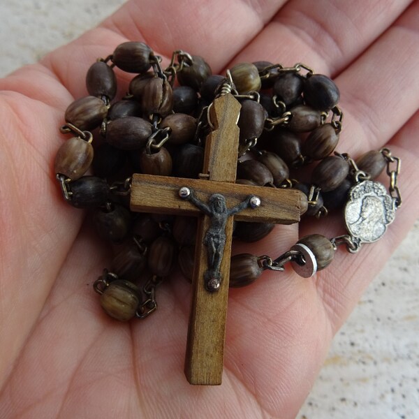 Religious antique catholic rosary with brown  beads of wood and center of Holy Virgin Mary and wooden cross of Jerusalem. ( F 23 )