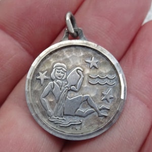 Vintage silver ( MARKED ) Zodiac constellation medal charm medallion pendant sign of Aquarius. ( waterman ) 16 A