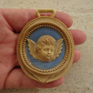 Religious antique French catholic medal pendant charm medallion of cherub guardian angel Saint Raphael. ( 13 a )
