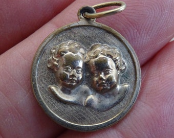 Religious antique French catholic silver plated medal pendant charm medallion Cherubs putti Guardian Angels. ( L 10 )