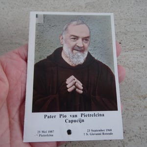 Religious catholic card shrine with photo of Padre Father Pio and his Stimata with inside relic of a piece of cloth.  SS 8