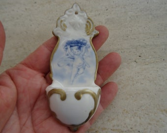 Religious antique catholic French Holy water font stoup of Brussels porcelain with guardian Angel Cherub carying fruit. ( L 6 )