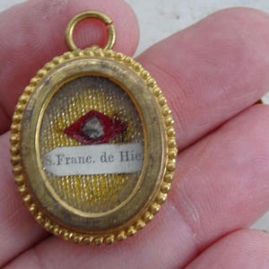 Religious antique copper reliquary medal shrine theca pendant with relic of Saint Francis Francois de Hier Jerome Geronimo. ( V 16a )