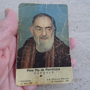 Religious catholic card shrine with photo of Padre Father Pio and his Stimata with inside relic of a piece of cloth.  SS 9