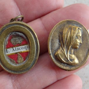 Religious antique French copper theca medal shrine pendant with relic reliquary of Saint Margaret Mary Alacoque. ( A 19 )