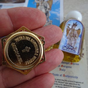 Religious Italian pendant relic shrine of Saint Michael Archangel with rock souvenir Monte Gargano with authentic document and oil. V 19