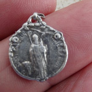 Religious antique French silver plated catholic medal pendant charm medallion of Saint Germain.  ( W 37 )