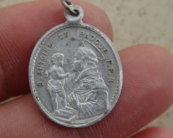 Religious antique French catholic medal pendant charm medallion of Saint Anthony of Padua and Saint Donat.  ( A 26 )