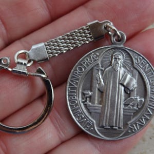 Religious silver plated catholic medal pendant medallion charm of Saint Benedict with key ring medal of exorcism against evil.  23