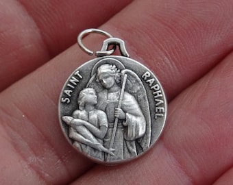 Religious vintage silver plated catholic medal pendant charm medallion of guardian angel Saint Raphael. ( A 2 )