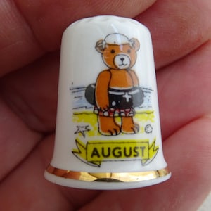 Vintage French porcelainen thimble thimbleful of the month august. ( A g 37 )
