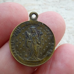 Religious antique copper French catholic medal pendant Holy charm medallion of Saint Odile and the Pieta with Holy Virgin Mary. 14