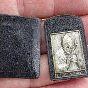 Religieus antiek kaartaltaar met de heilige Alfons en de Heilige Maagd Maria van Altijddurende Bijstand. ( j 17 )