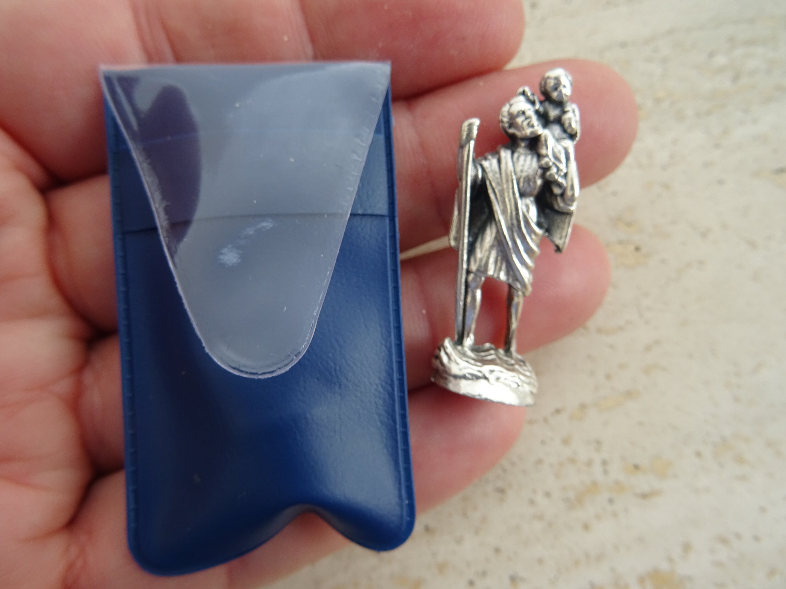 Religious catholic plastic pocket shrine relic holder with silver plated statue of Saint Christopher. ( A 14 )