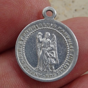 Religious antique French aluminium medal pendant charm medallion charm of Saint Michael Archangel and Holy Virgin Mary.  A 37