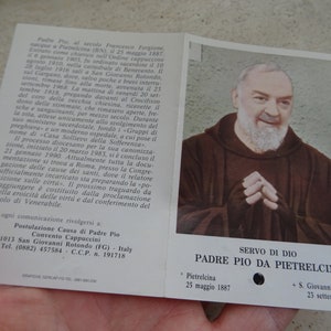 Religious catholic card shrine with photo of Padre Father Pio and his Stimata with inside a piece of cloth touched to his cuffin.  U 9