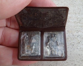 Religious vintage catholic pocket shrine relic holder with silver plated plaque of Saint Christopher souvenir of Banneux. ( n 3 )