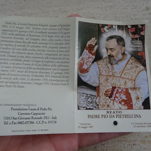Religious catholic card shrine with photo of Padre Father Pio and his Stimata with inside a piece of cloth touched to his cuffin.  ZZ 26
