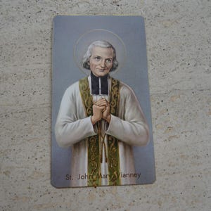 Ancienne carte religieuse catholique française représentant Saint Jean Vianney, curé d'Ars. ( T 34 )