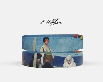 May include: Two blue and white patterned bands with a scene of people and a dog. The text "E. Hopper" is written in black above the bands.