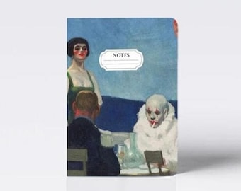May include: A small notebook with a blue and white cover featuring a painting of a clown and two people. The cover has the word "NOTES" printed on it.