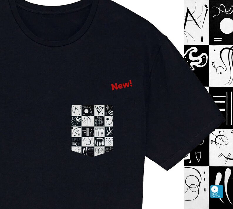 May include: A black t-shirt with a white pocket featuring a graphic design of abstract shapes and the word "New!" printed in red above the pocket.