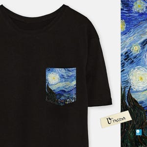 May include: Black t-shirt with a pocket featuring a painting of "The Starry Night" by Vincent van Gogh. The pocket is on the left side of the shirt.