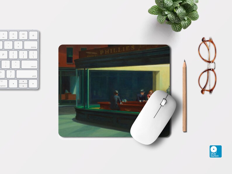 May include: A mouse pad featuring a painting of a diner at night with the words "PHILLIES" above the entrance. The diner is lit up with a warm glow, and there are three figures sitting at the counter.
