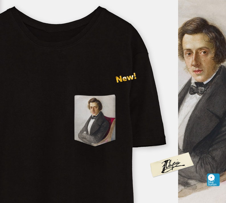 May include: Black t-shirt with a pocket featuring a portrait of a man in a suit and bow tie. The text "New!" is printed in gold on the shirt.
