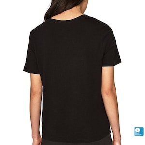 May include: A black short-sleeved t-shirt with a crew neck.