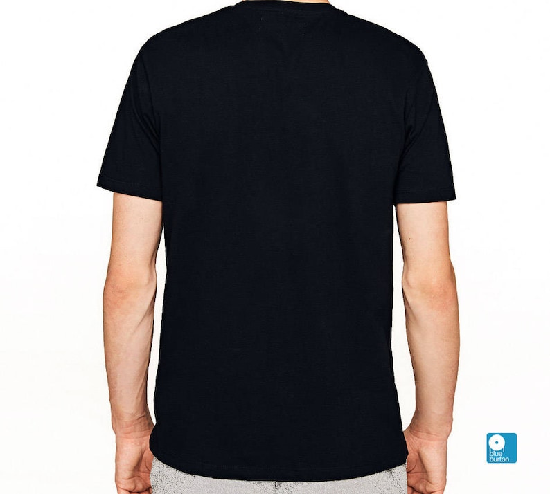 May include: A plain black t-shirt with short sleeves.