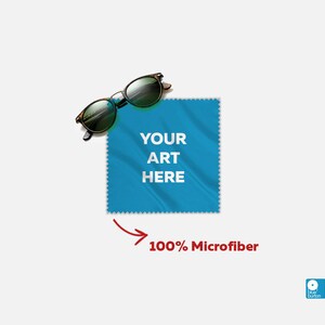 May include: Blue microfiber cleaning cloth with the text "YOUR ART HERE" printed on it. A pair of sunglasses is on top of the cloth. The text "100% Microfiber" is written below the cloth with an arrow pointing to it.