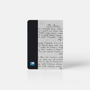 May include: A black and white notebook with a handwritten excerpt from "The Raven" by Edgar Allan Poe. The text is in cursive and includes the lines "on a midnight dreary, while I pondered, weak and weary, over many a quaint and curious volume of forgotten lore."