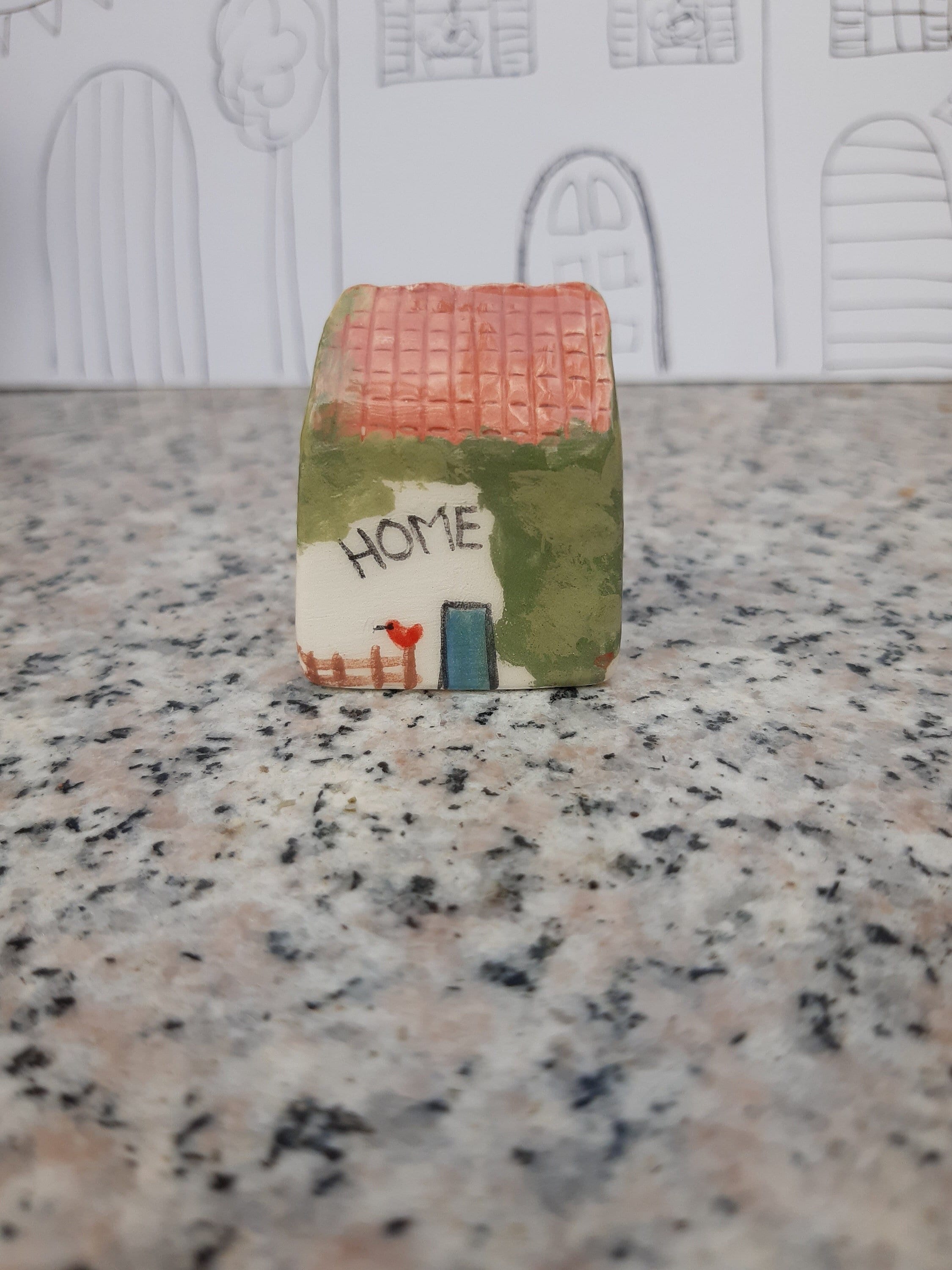 Handmade Ceramic House: Tiny Home Decor with Red Bird
