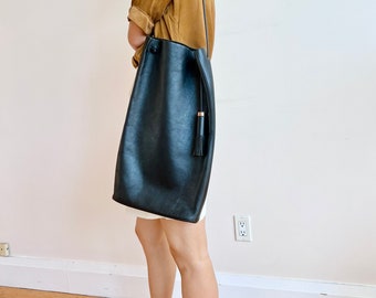 Building Block black long leather tote bag with tussle