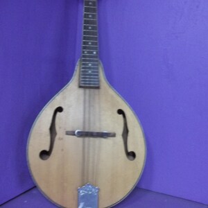 Old vintage antique hand made musical instrument mandolin medieval re-enactor