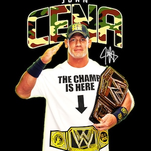 May include: John Cena wearing a white t-shirt with the text "The Champ Is Here" and a black and gold WWE Championship belt. He is saluting with his right hand and wearing a black and yellow camouflage "U.S. Me" baseball cap. The background is black with the text "JOHN CENA" in a camouflage pattern.