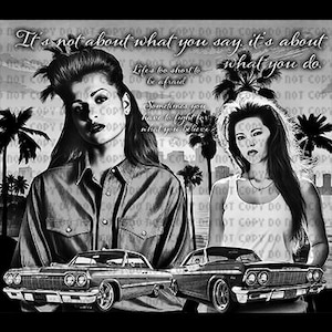 May include: Black and white image of two women standing in front of a cityscape. The women are wearing casual clothing and have long hair. The text "It's not about what you say, it's about what you do." is displayed in the upper part of the image. The text "Life's too short to be afraid. Sometimes you have to fight for what you believe." is displayed in the middle of the image. Two classic cars are in the foreground of the image.