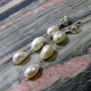Long nugget pearl earrings natural white baroque pearl drop earrings in sterling silver with shell shaped top image 5