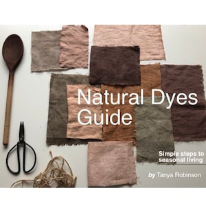 May include: Natural dyes guide with swatches of fabric in various shades of brown, pink, and green. The text reads "Natural Dyes Guide" and "Simple steps to seasonal living by Tanya Robinson".