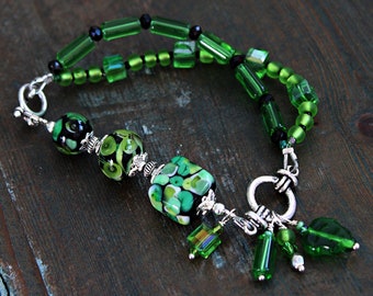 Green beaded Asymmetrical bracelet, Artisan Lampwork bracelet green Bohemian bracelet, Boho beaded bracelet, Glass bracelet for women,