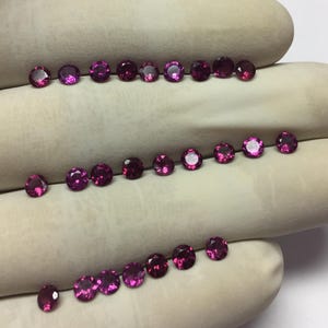 AAA Rhodolite Garnet Gemstones: 10 Piece Round Cut Lot (2-6mm)