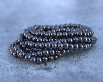 Hematite 6 MM Beaded Bracelet