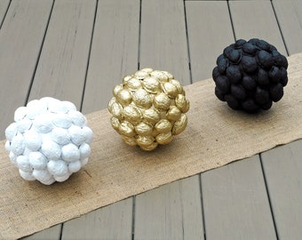 Three Decorative Orb Set: Sculptural Gold, Black, and White balls table centerpiece