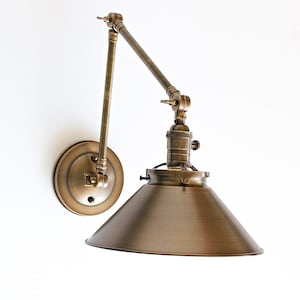 Wall Sconce With Metal Cone Shade and Adjustable Arm