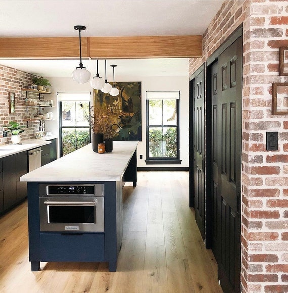 Schoolhouse pendants over kitchen island outlet