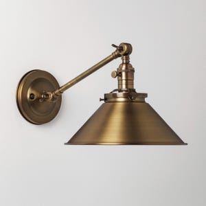 Sconce Lighting with Spun Brass Shade Adjustable Arm Fixture