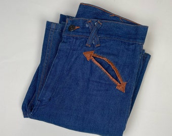 Calça jeans boca de sino vintage dos anos 70: cintura alta com estilo western